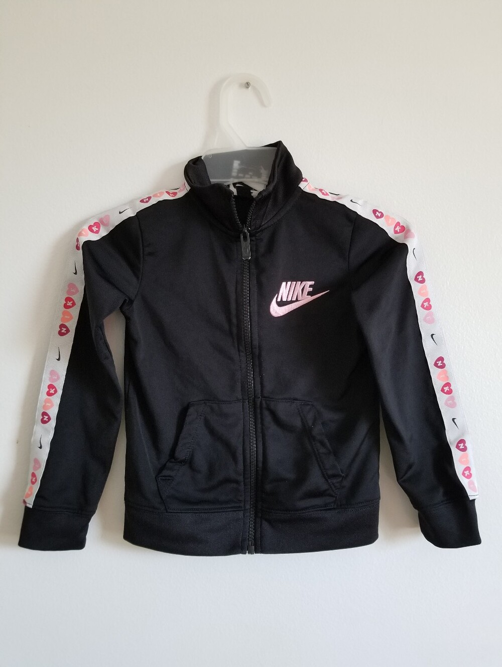 Nike Kids' Black Zip-Up Jacket with Pink Logo and Heart Tape